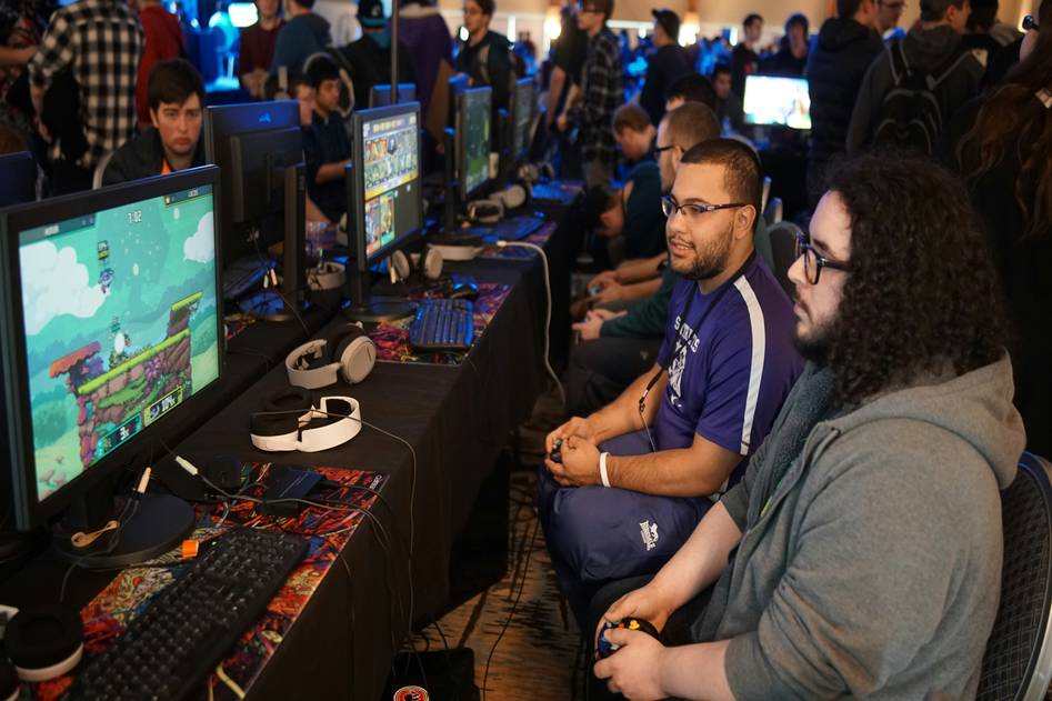 Focused Overwatch League player in action during a live match